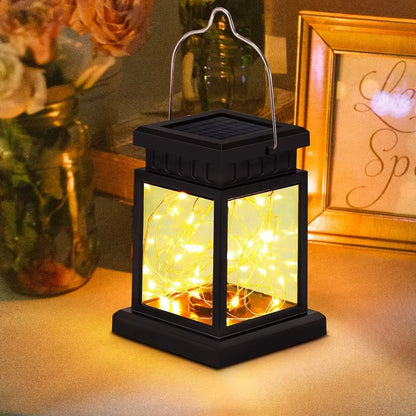Manto™ Solar LED Outdoor Lantern with Candle Light