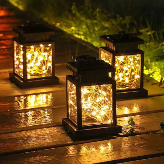 Manto™ Solar LED Outdoor Lantern with Candle Light